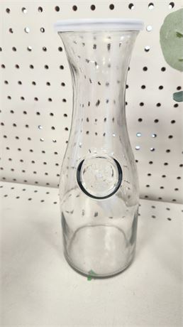 Glass vase, old style milk jug,