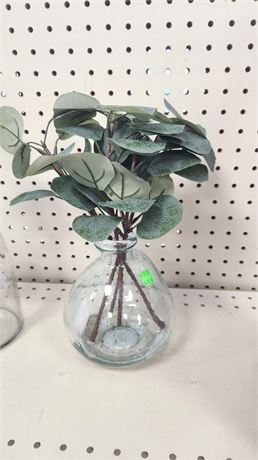 Glass vase with faux plants