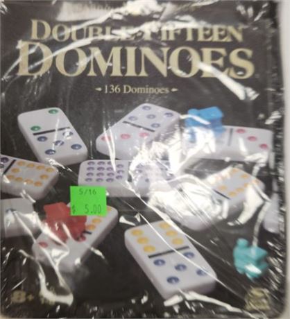 Double Fifteen dominos **tin is damaged but dominos are okay**